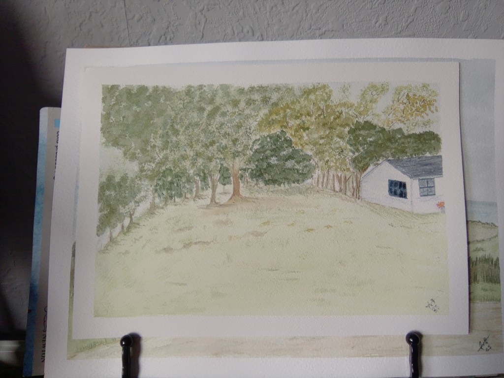 Watercolour landscape painting of trees and a white cottage