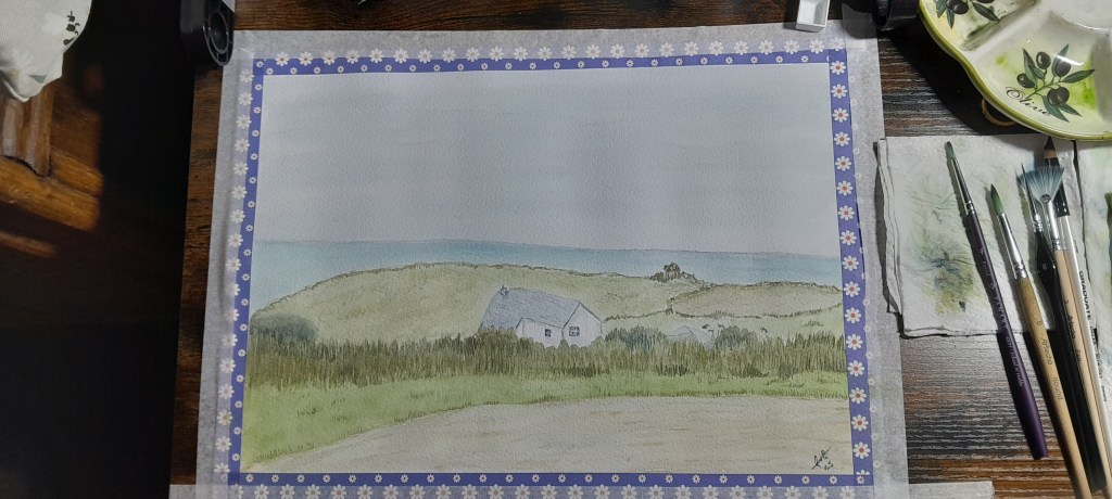 Watercolour landscape painting of a cottage by the sea with rolling hills